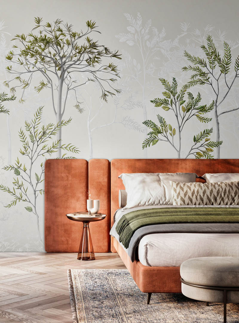 Skog contemporary wallpaper by Artedimuro, showcasing botanical illustrations of trees and leaves in a modern bedroom setting with warm tones and a Scandinavian-inspired design