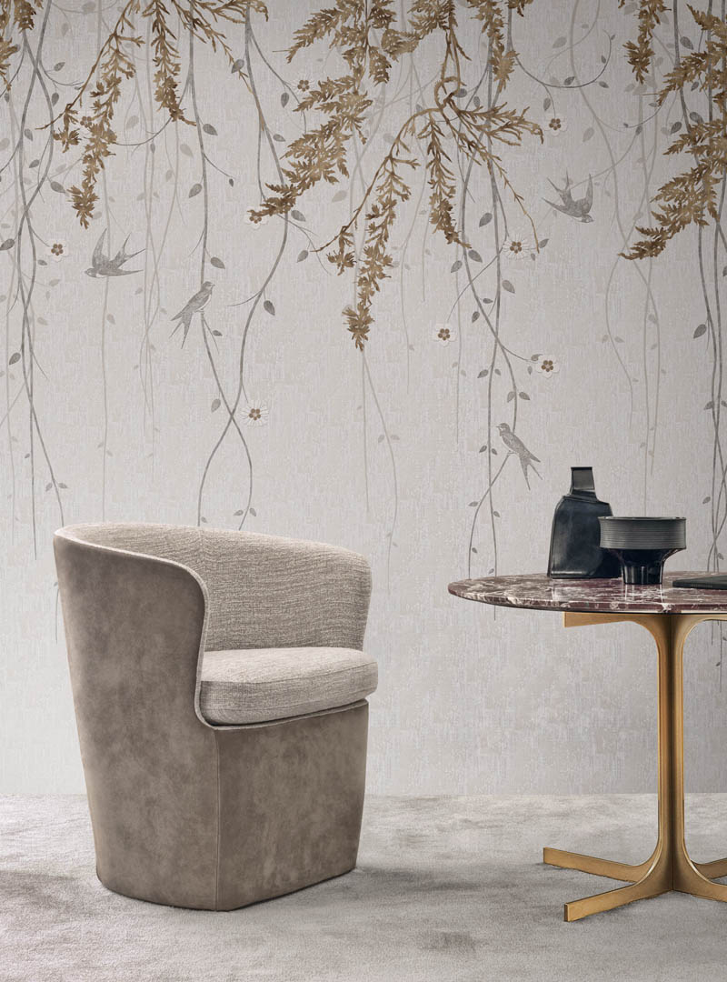 Mudita II Toronto wallpaper installed in a modern sitting area with soft hanging vines and subtle bird illustrations.
