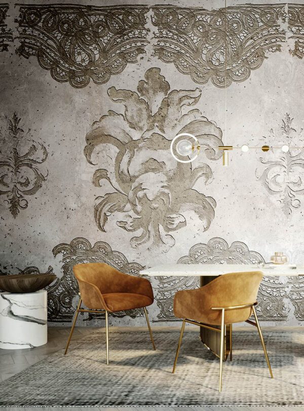Faded Grace vintage lace wallpaper mural installed in a modern dining room with caramel chairs, marble furniture, and brass accents.