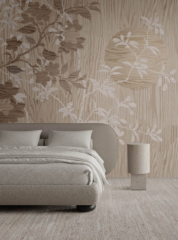 Haru III botanical wallpaper installed behind a neutral upholstered bed in a warm contemporary bedroom.